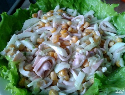 Великолепный салат с кальмарами: заполните свою тарелку ароматным и сочным блюдом!